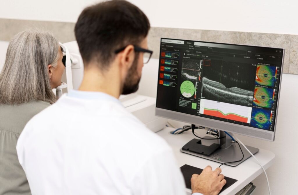 An eye doctor screens a patient for AMD during a routine eye exam using OCT scans.